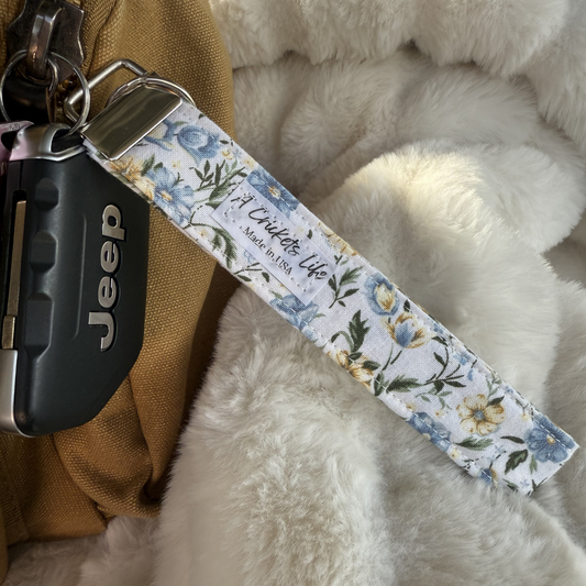 Handmade Blue Wildflower Wristlet in Blue and yellow flower pattern fabric